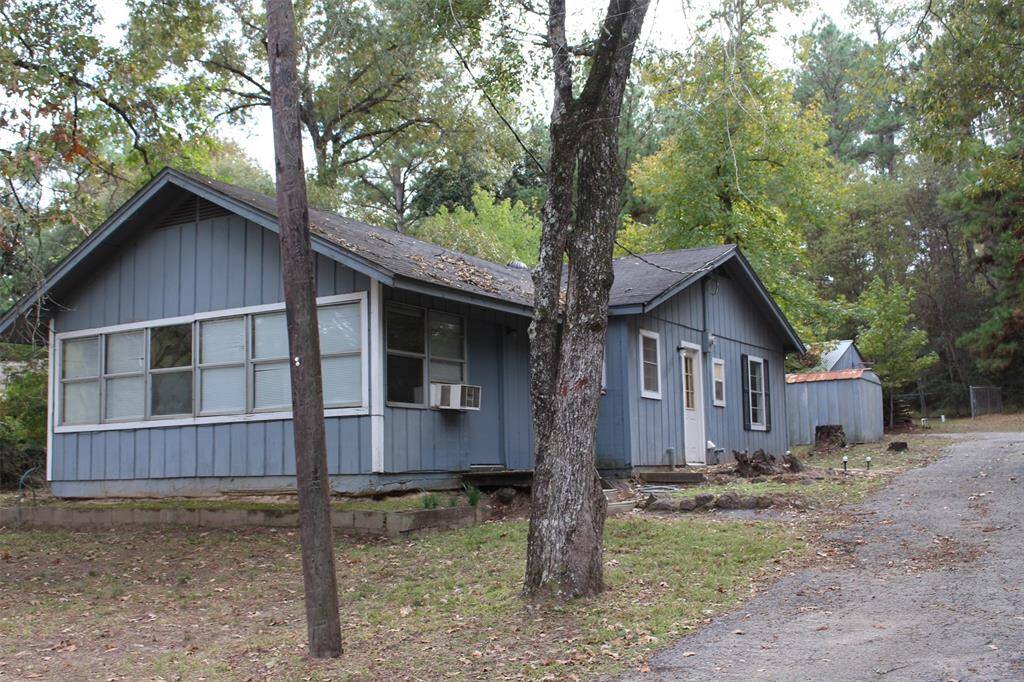 Wall of windows in the front of the home. Great way to see the deer and the lake view.