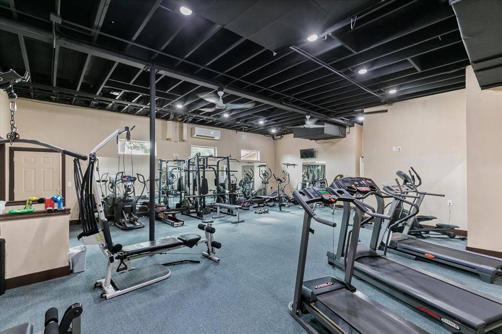 A fitness center located in the county club fully equipped to meet all your health and wellness needs. Exercise classes are offered.