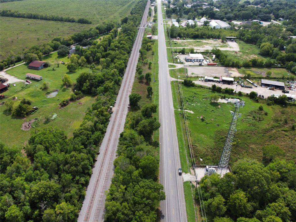 This view provides no markings.    Property is south of the railroad tracts being that all frontage.