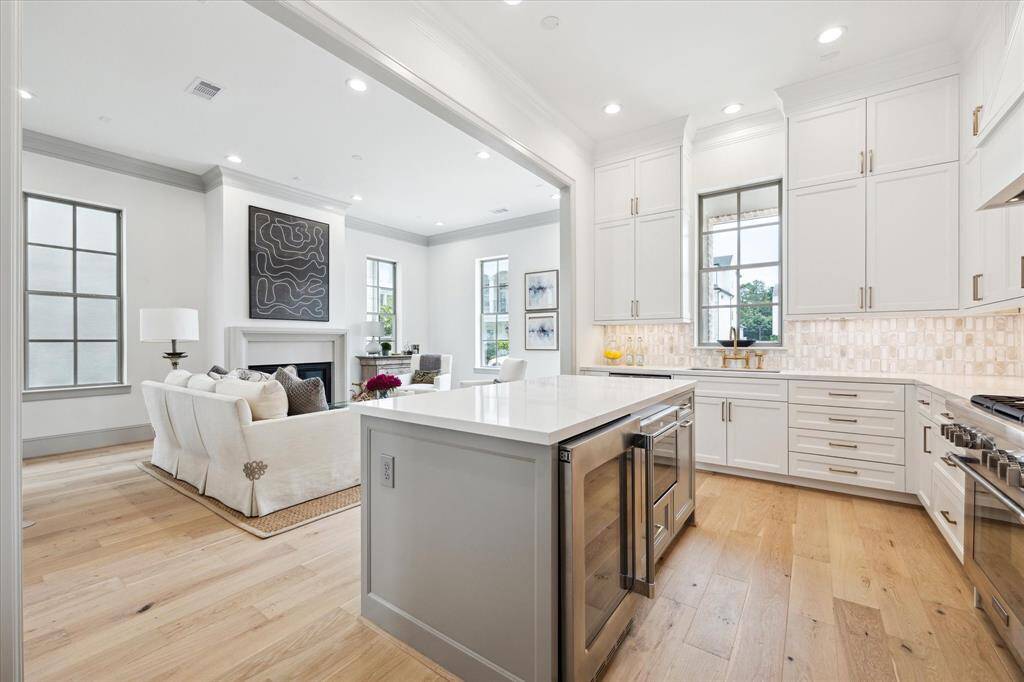 Kitchen conveniently opens to Living Room and Dining Room for entertaining.