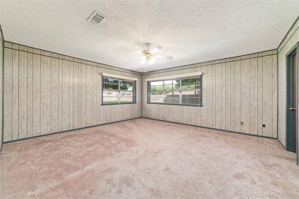 Primary bedroom sits at the back of the home and is huge!