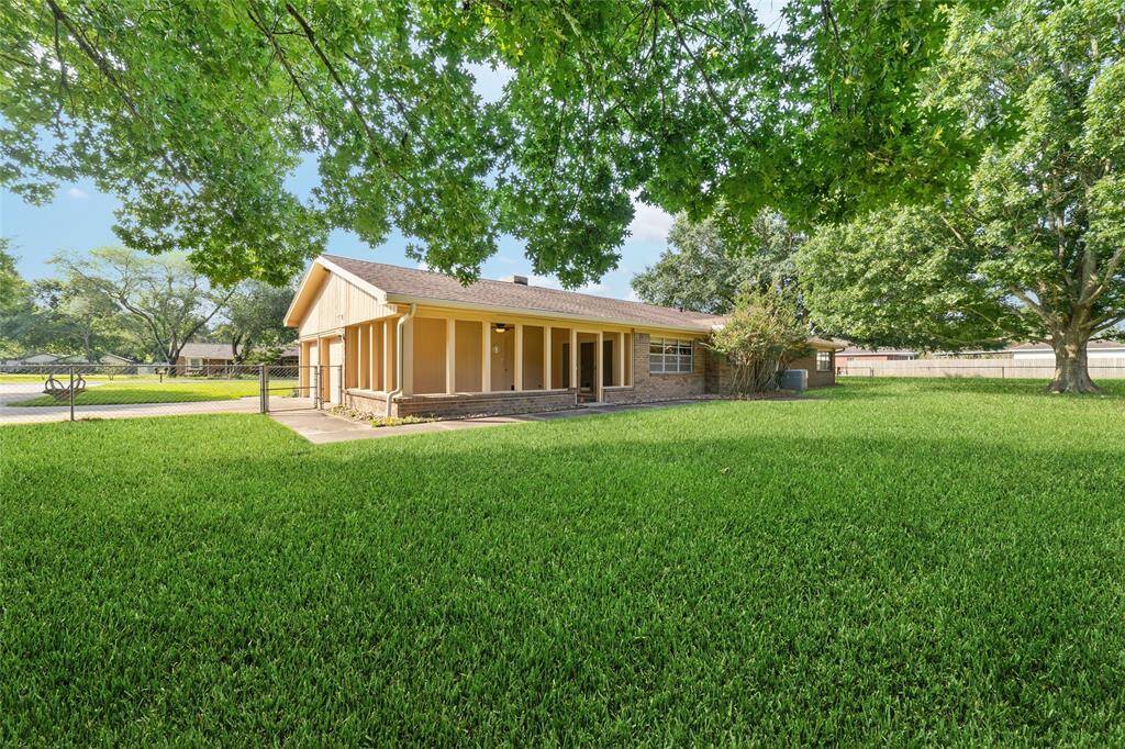 Another view of the backyard, and the porch.  Notice all of the gorgeous trees on this property.