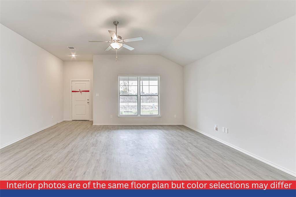 As you enter, you'll be greeted by a warm and inviting living room.