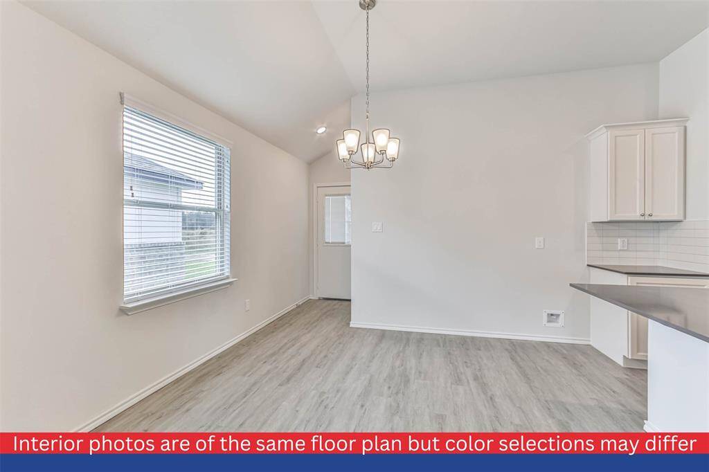Raised 10' ceilings in living areas and primary bedroom is a must see.