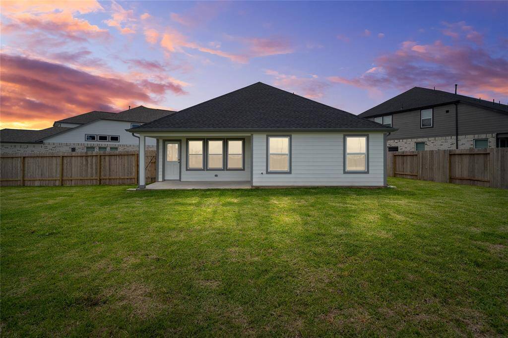Come and see this spacious backyard with its beautiful covered patio. There is plenty of room for the kids to play and adults to relax! Perfect for your outdoor living space, patio furniture, bbq pit, and so much more. The possibilities are endless!