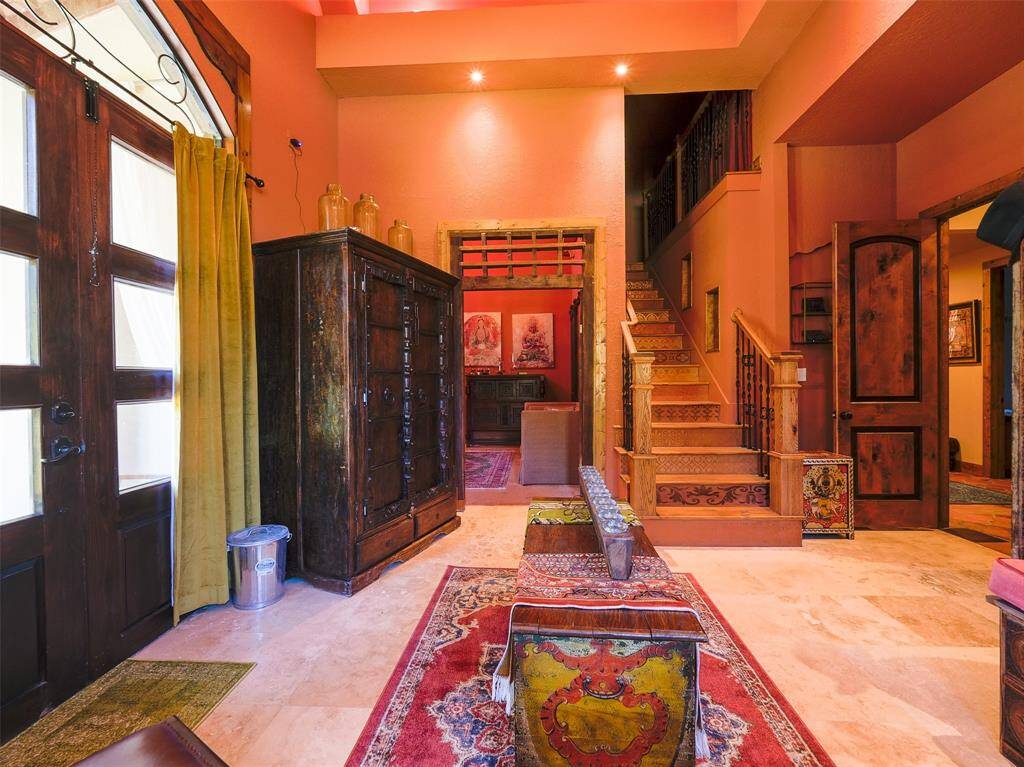 Downstairs primary suite includes a loft bedroom.