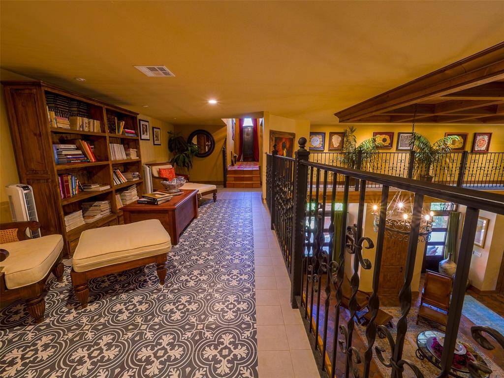 Library and gallery that overlook the great room.