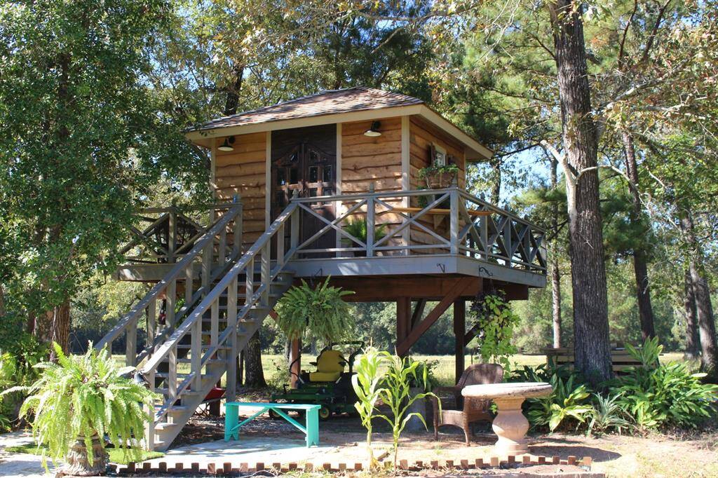 All cedar tree house in the back yard.  Great for kids of all ages.