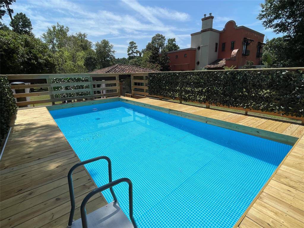 Attractive pool with deck surround.