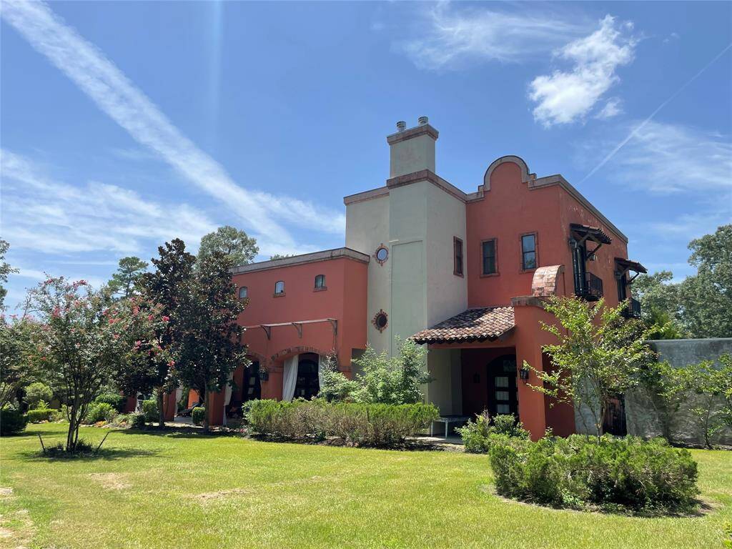 The finest non-waterfront estate on Lake Conroe.  Easy to get to , hard to leave.