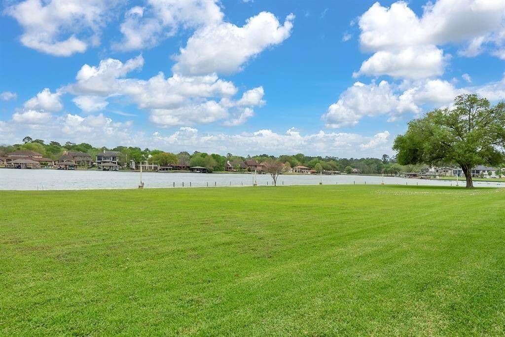 The driving range is Driving range with views of Lake Conroe.
