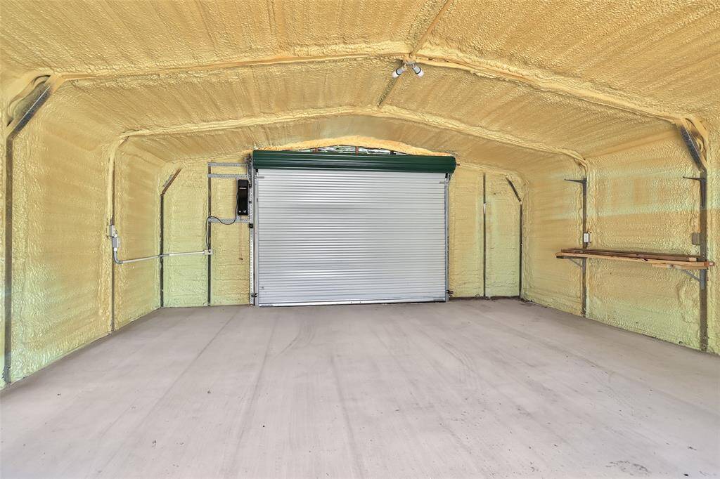 This insulated garage offers enhanced energy efficiency and year-round comfort.