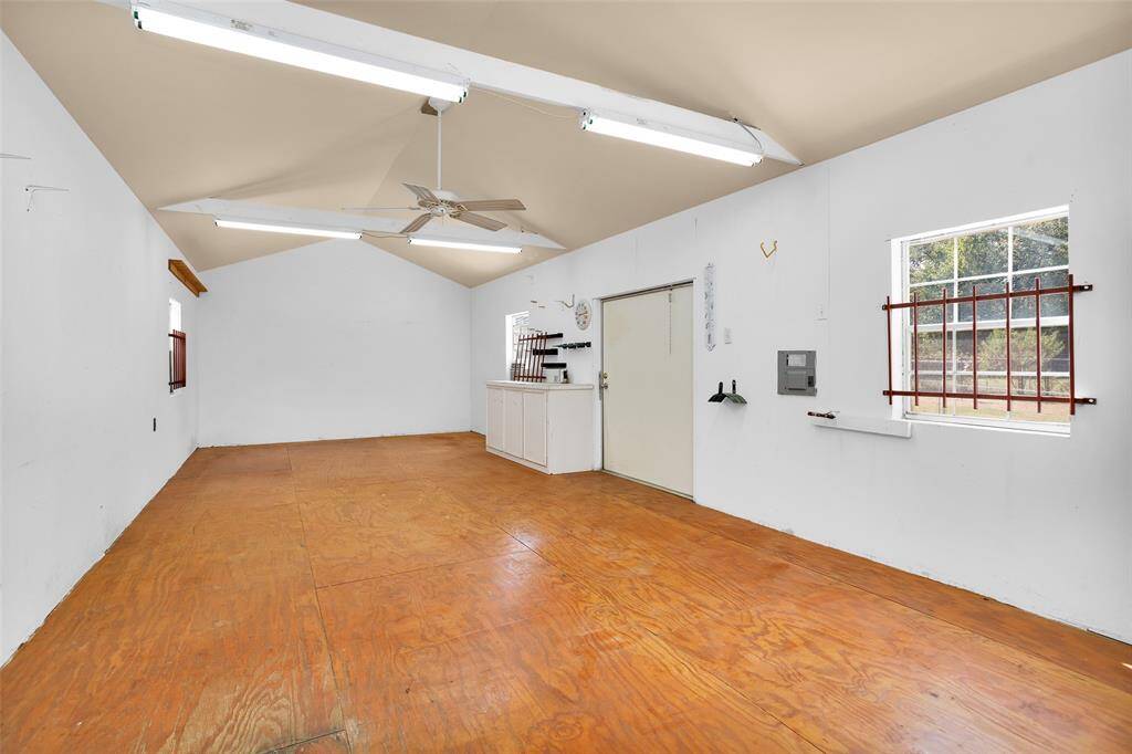 Stay comfortable with air conditioning and a ceiling fan, complemented by a spacious, wide door.