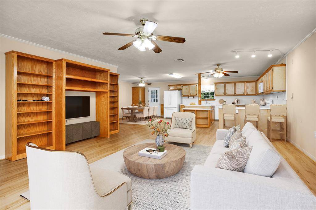 This virtually staged image highlights the spaciousness and potential of a fully furnished room, perfect for envisioning your ideal living space.