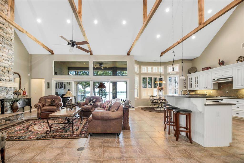 The cathedral ceilings with gorgeous high beams really make this space unique.