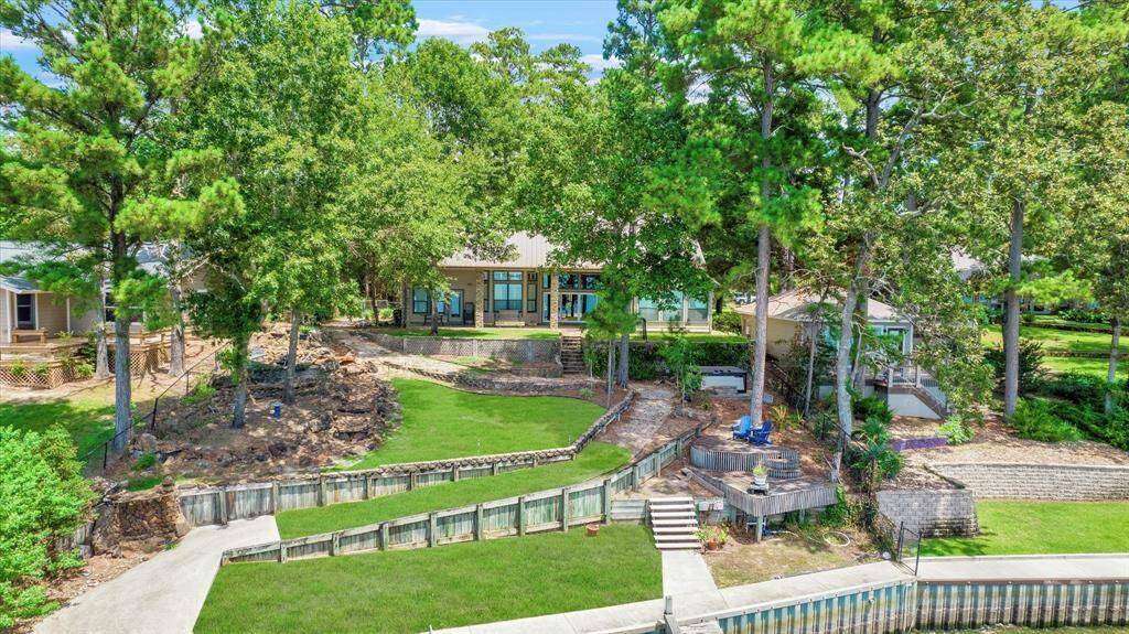 Check out the gorgeous backyard with it's winding paths and picturesque views.