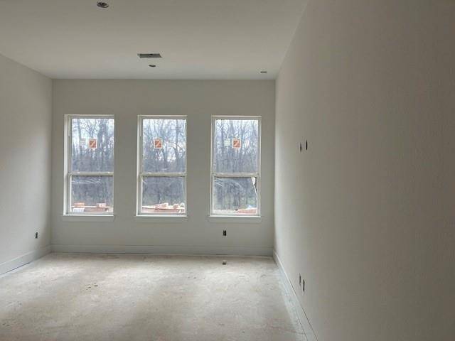 Main bedroom is on the rear of the home with a view of the backyard.