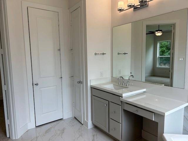Corner free standing tub is a treat for relaxation and comfort.