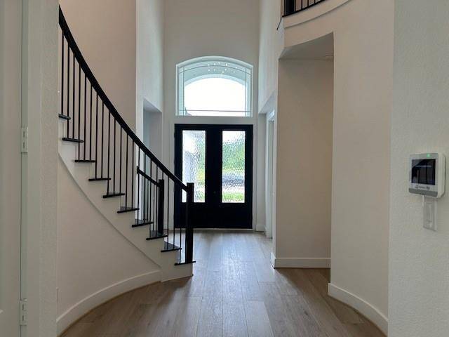 Eight Ft Double doors welcome your guest.