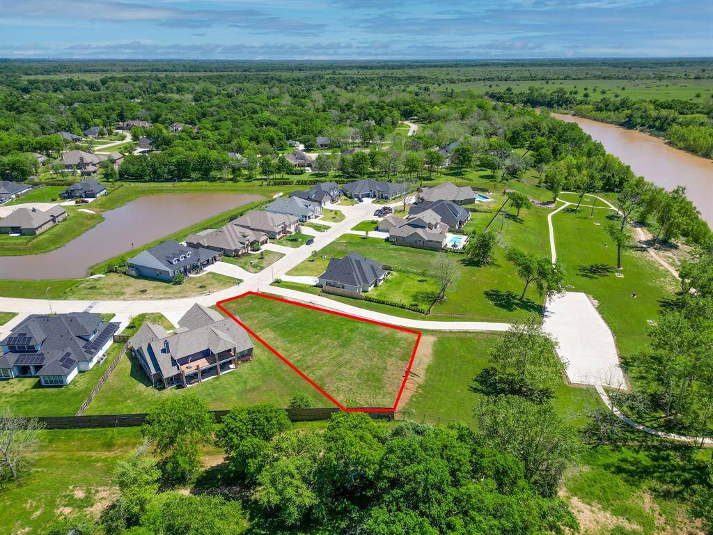The walking trails connected to the lot creates the perfect location for those walks in the neighborhood!  3033 Whispering Pecans Dr. Fulshear, TX  77441