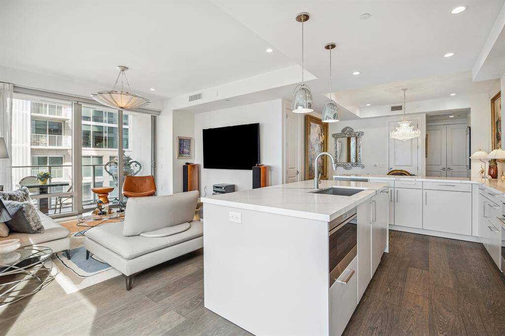 Alternate view of the kitchen and living area.