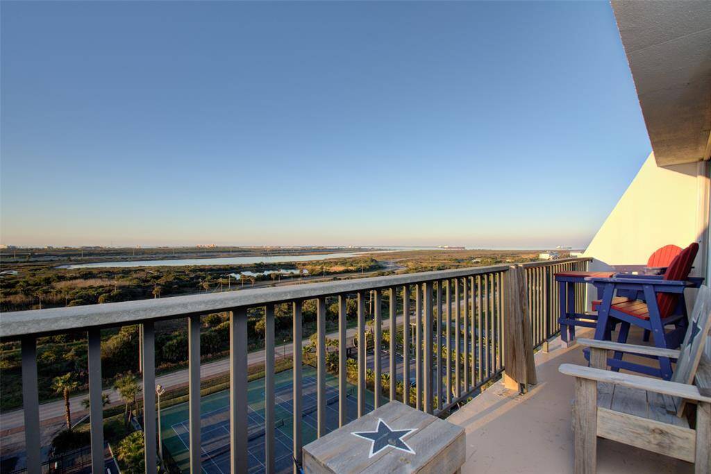 The balcony has plenty of room for comfortable outdoor furniture.