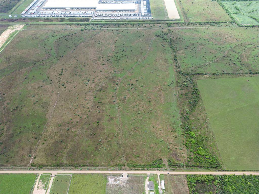 Close View from Harrison Rd showing Walmart Distribution at the end of the property