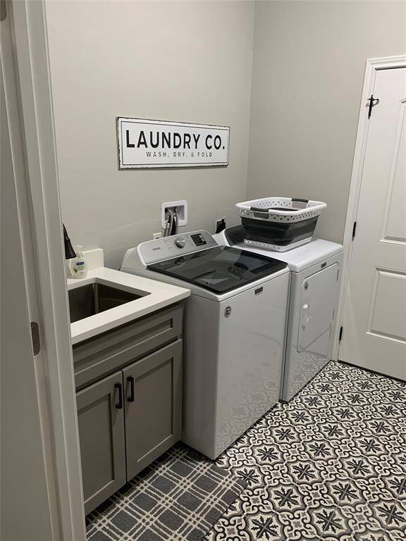 Laundry room with built in sink
