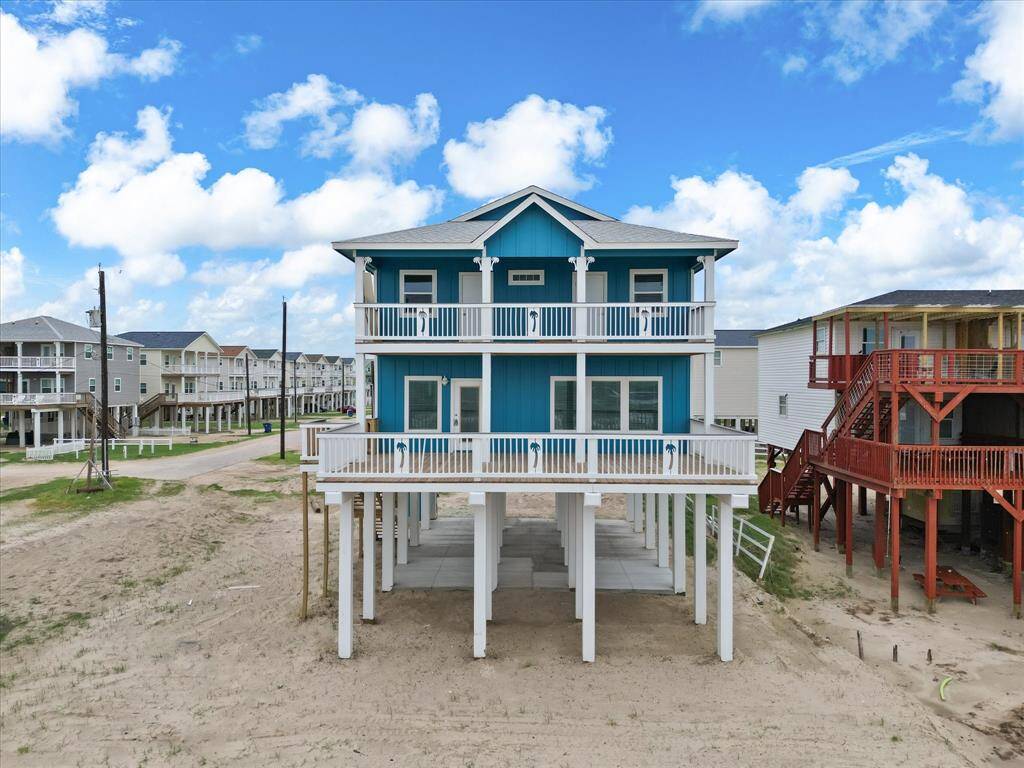 Beachfront paradise with expansive decks offering stunning ocean views. Perfect for relaxation and entertaining.