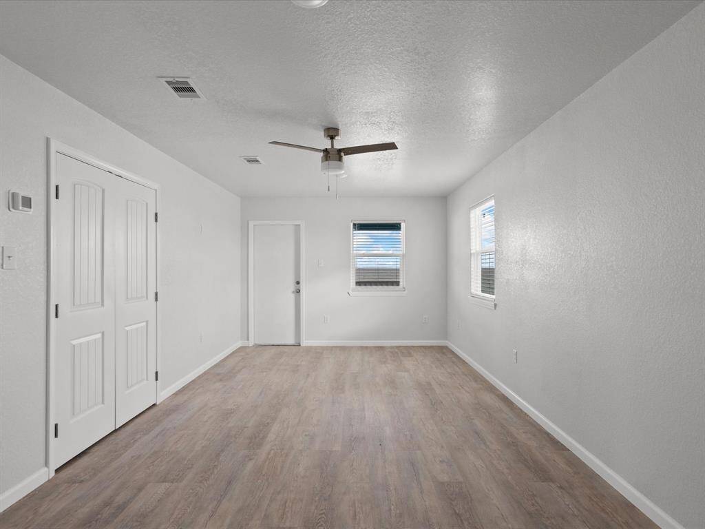Indulge in the master suite featuring an ensuite bathroom and direct deck access.