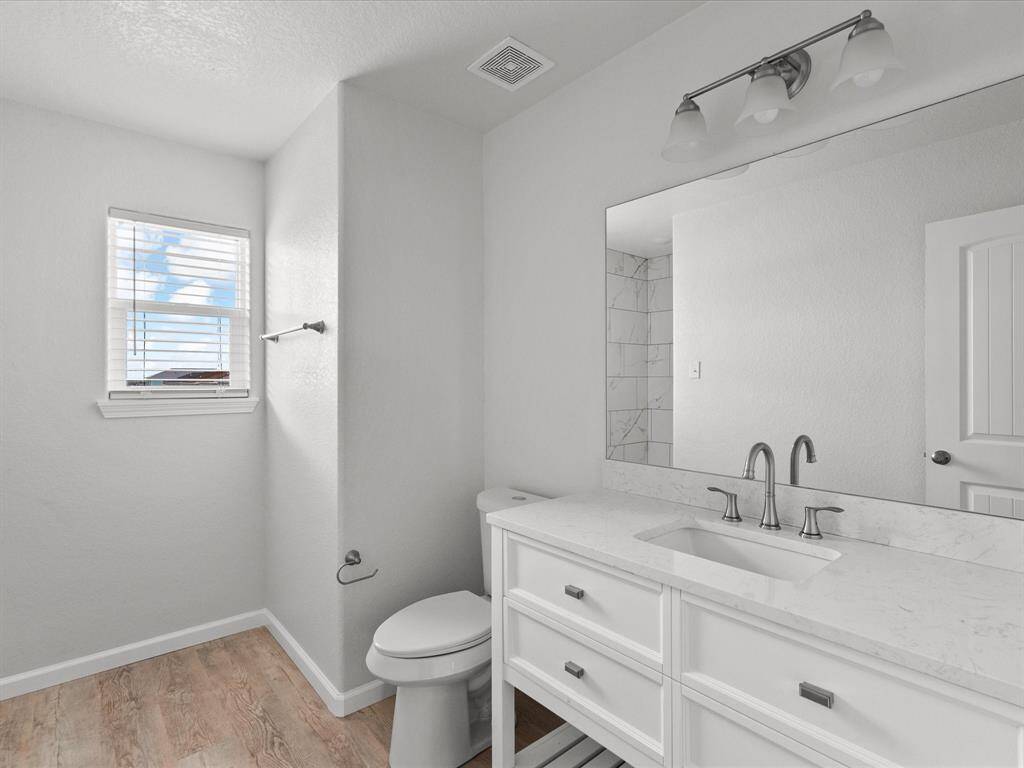 Upstairs features a convenient hall bathroom.