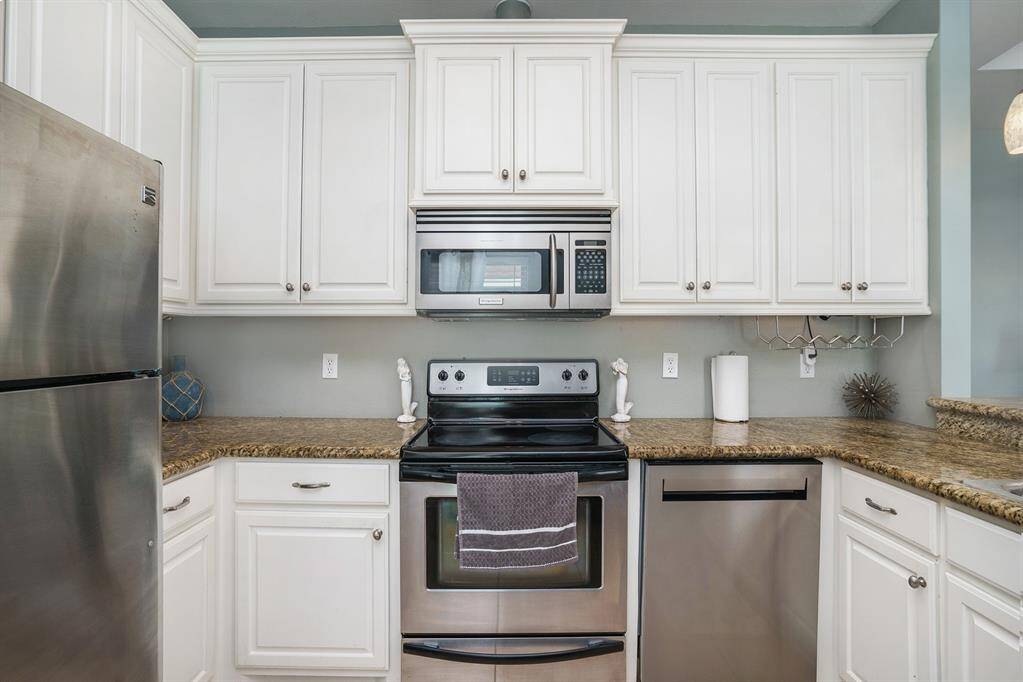 Kitchen area with an abundance of storage and counterspace.