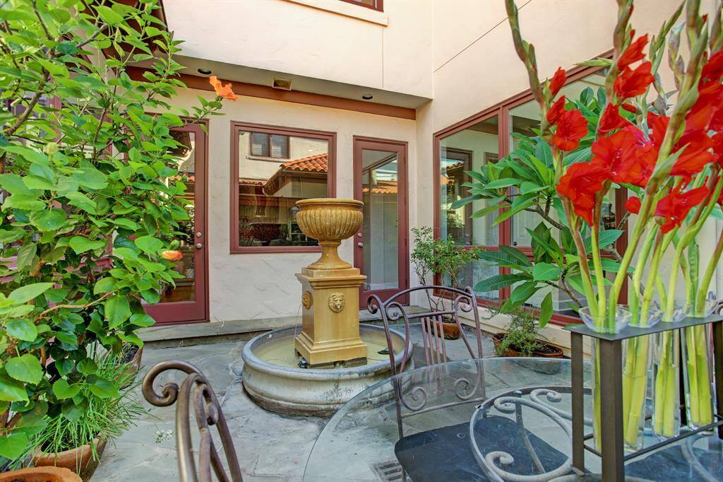 Step outside from your kitchen and enjoy a moment by the fountain