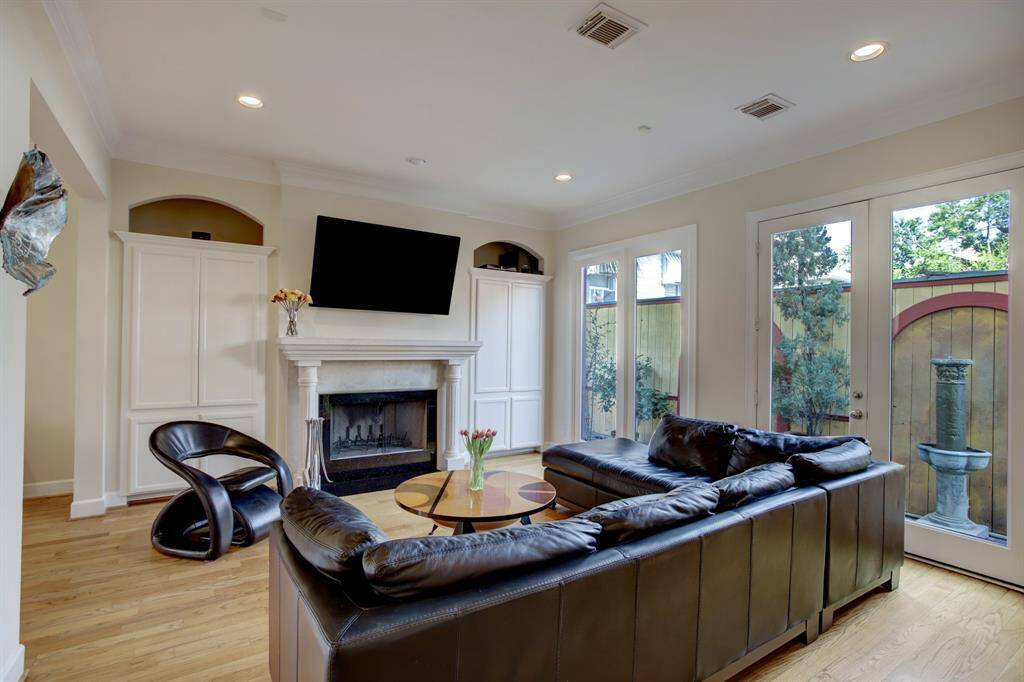 Once again you will find things neat and tidy here with built ins behind the doors along with a place for your  sound system for you movie buffs and music lovers!