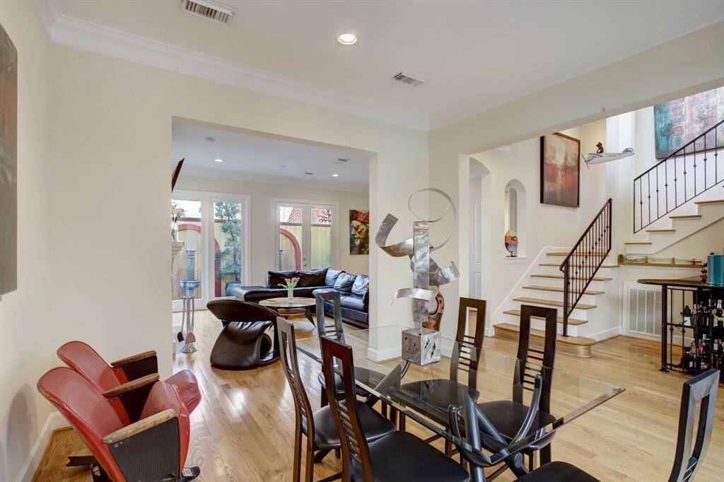 Take a seat at the table and you will experience the open feel of this nicely appointed home in the heart of the River Oaks area!