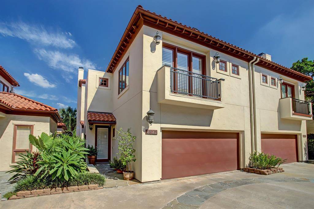 Mediterranean village style living with private outdoor spaces for dining and entertaining.  The oversized motorcourt makes for easy in and out of your garage.