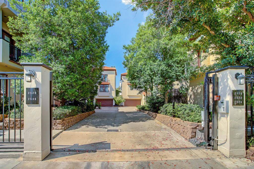The automatic gates open for you to enter and exit your peaceful city retreat!  WELCOME HOME!