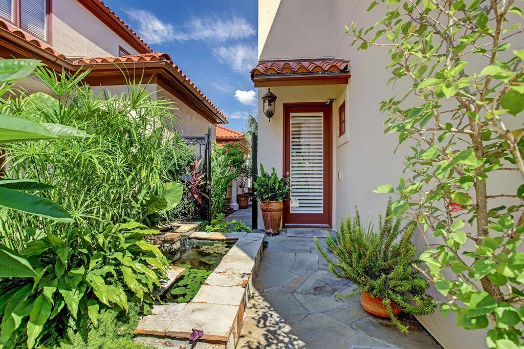 Enter past the Koi pond through this unassuming entrance where your guests will delight in the bright and cheerful entrance.