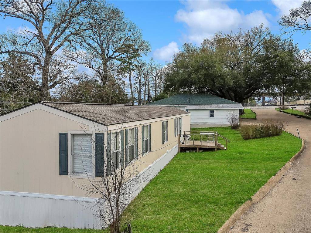 View from driveway by the Tri-plexes