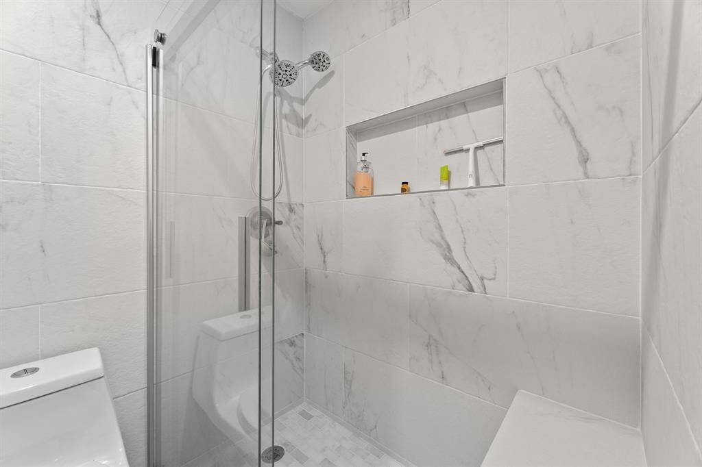 Updated large shower with seat