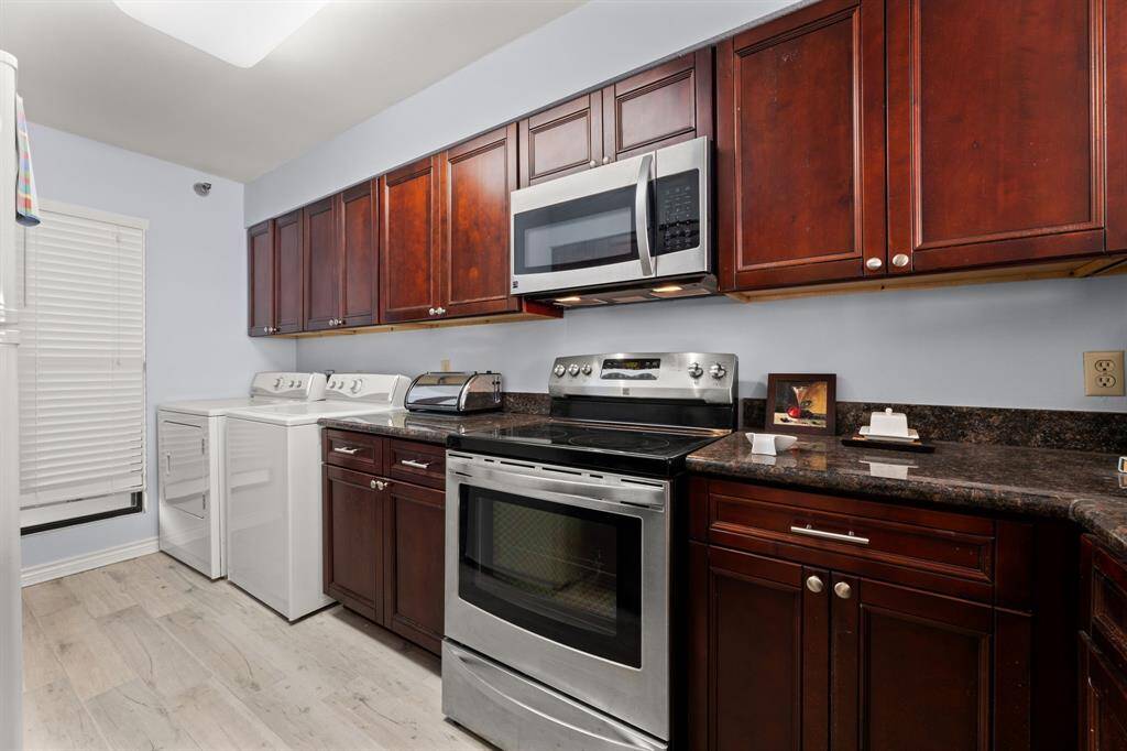 Kitchen with Cherry Cabinets and granite counters - Stainless Steel Appliances