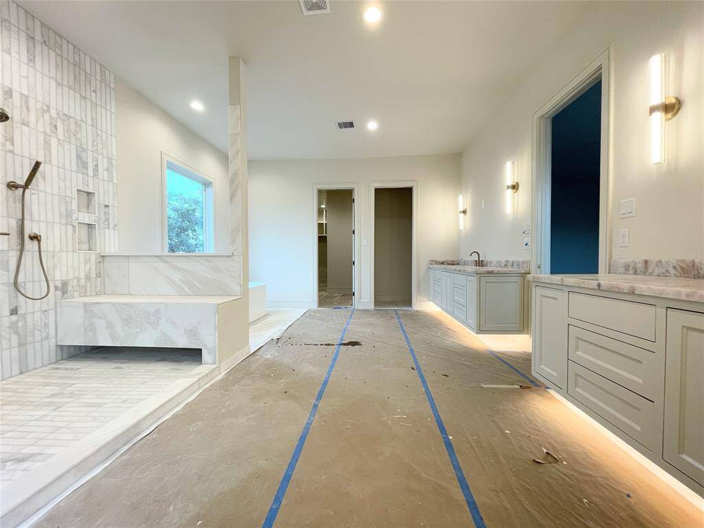 Primary Bathroom with oversized Shower Wash Room and stand alone soaker tub. Photo Update 2/10/25