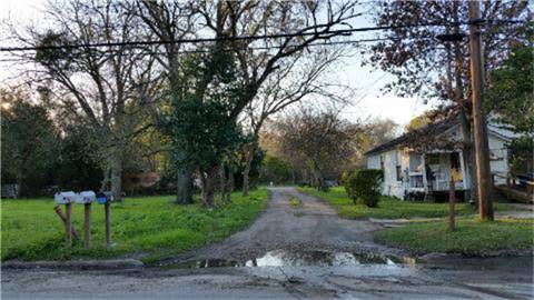 This structure leading to the lot no longer exists
