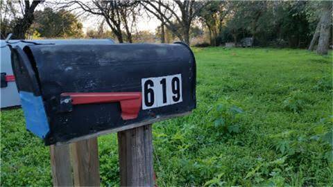 There is a gate north of these mailboxes that protects the easement leading to a half acre that's adjacent to this listed acre
