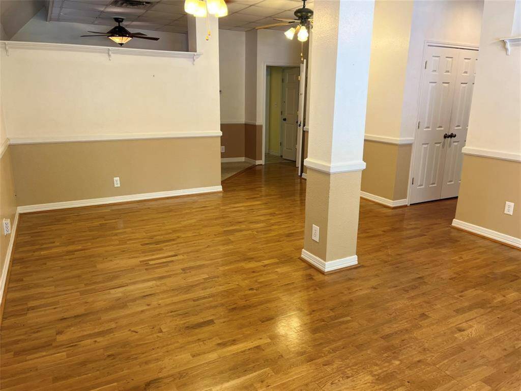 Living room from front to hallway to separate living quarters.