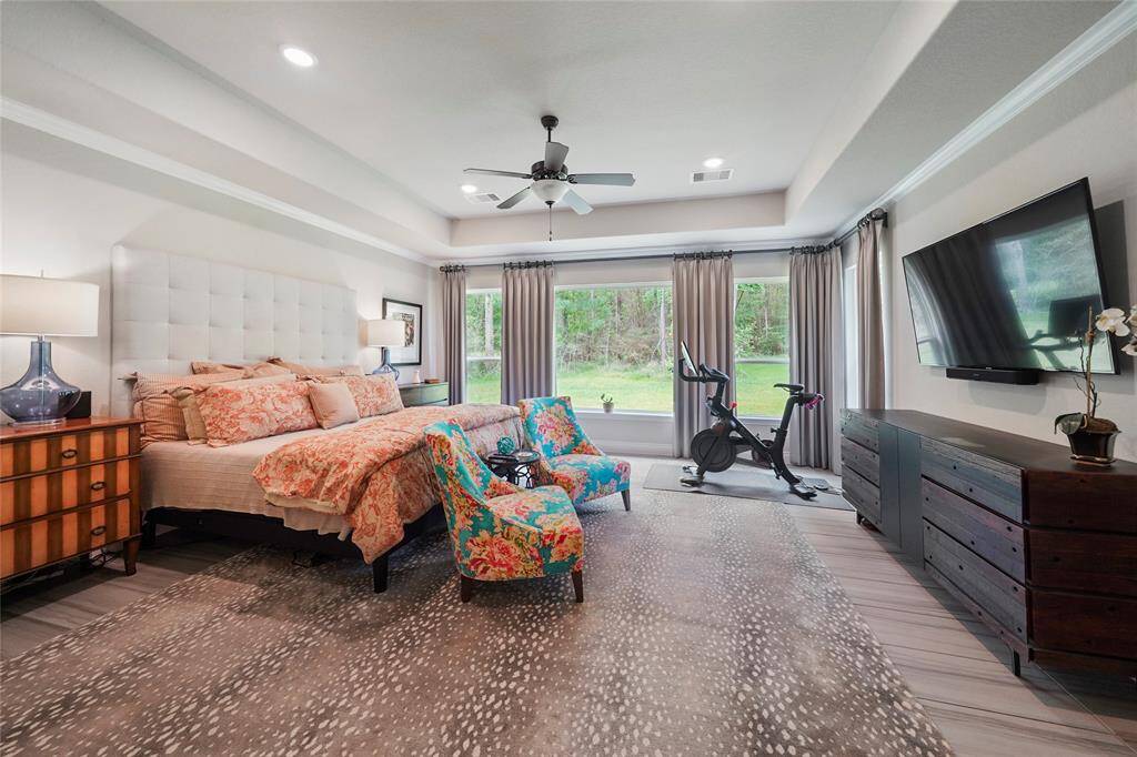 High ceilings and beautiful views of the private backyard.