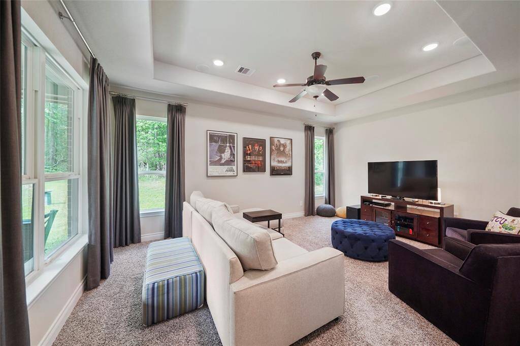 Enjoy a movie in this large private media room.