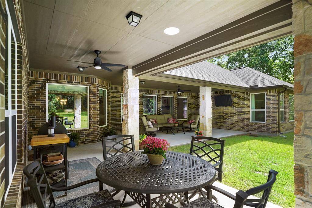 Great outdoor living.  Large covered patio is perfect for enjoying a morning cup of coffee.