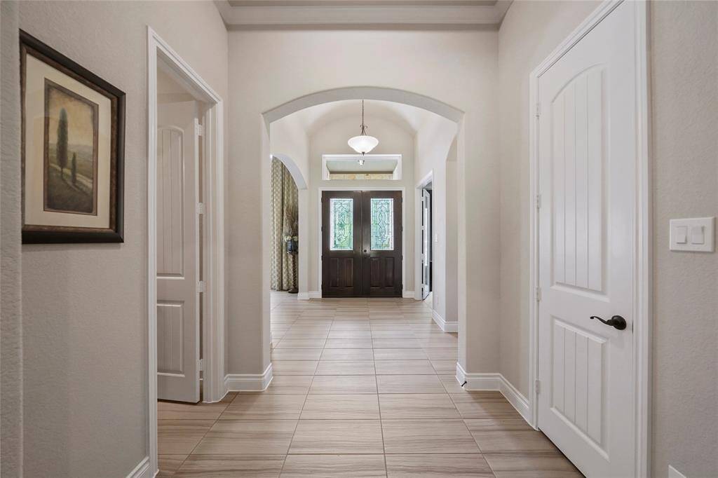 Custom window coverings and designer lighting.