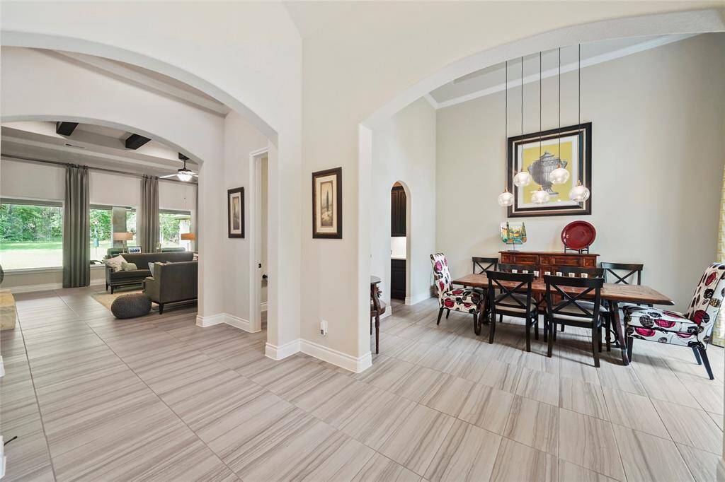Such open living.  View towards the formal dining and the great room beyond.